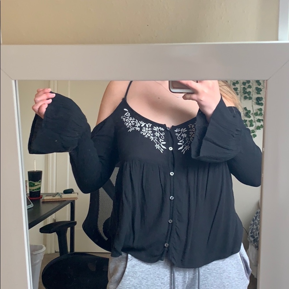 Black flowy partially off the shoulder top